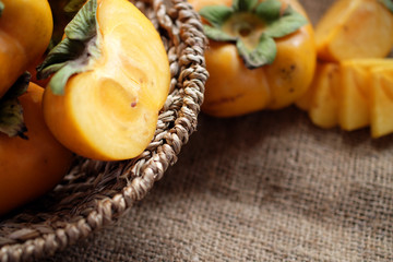 persimmon fresh close up on background.