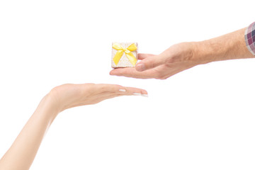 a man's hand gives a gift