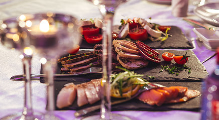 Preparation for the banquet. Served table.