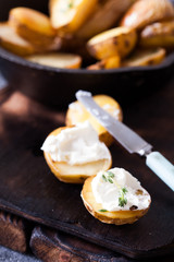 Baked spicy potatoes with thyme on parchment