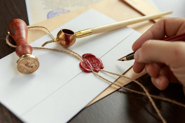 Notary's public pen and stamp on testament and last will. Notary public tools