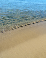 The Black Sea beach with golden sands, blue fresh clear water, bulgarian shore
