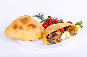 two samosas with vegetables