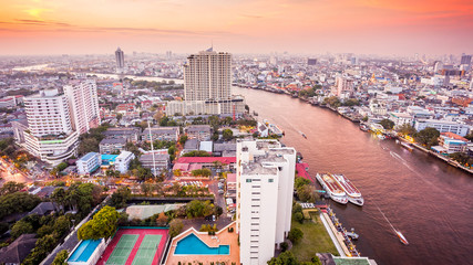 Fototapeta na wymiar Bangkok Skyline and Chao Phraya River at Sunset in Thailand