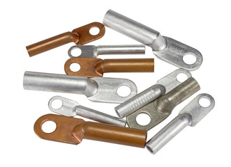 Electric terminals of different size on white