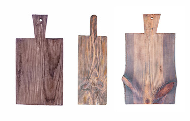 Three old cutting boards