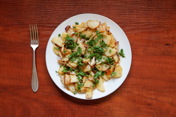 Fried potatoes with bacon and parsley VII
