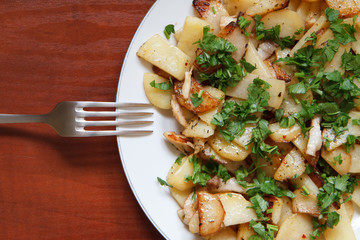 Fried potatoes with bacon and parsley VI