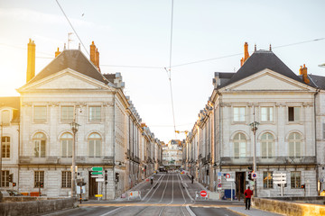 Street view in Orleans city during the sunset in central France - obrazy, fototapety, plakaty
