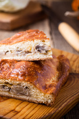Slices of cabbage and mushroom pie with cheese