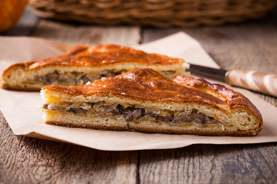 Slices of cabbage and mushroom pie with cheese