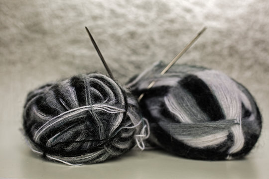 knitting needles and wool ball