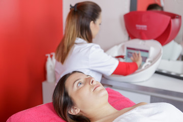 face treatment woman in beauty salon