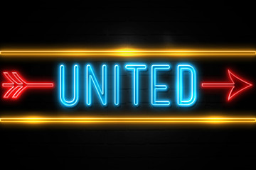 Fototapeta na wymiar United - fluorescent Neon Sign on brickwall Front view