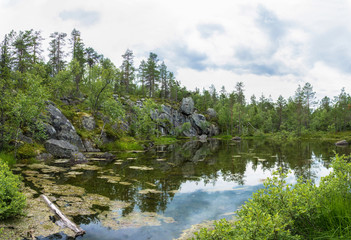 A small lake in the rocky shores of Karelia.