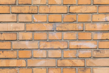 Obraz premium old yellow brick wall background