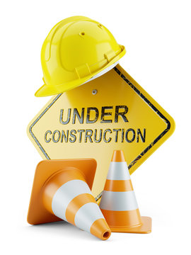 Safety helmet on signboard and traffic cones and under construction sign