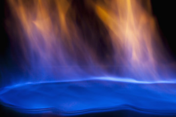 Fire flames on a black background as symbol of gas and oil industry