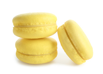 Lemon macarons on white background