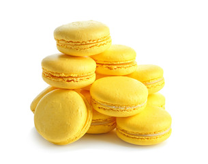 Lemon macarons on white background