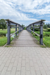 Obraz premium footbridge over a small river 