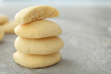 Fototapeta na wymiar Stack of homemade cookies with lemon flavor on table