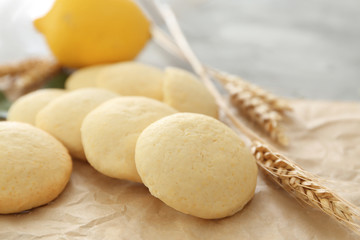 Fototapeta na wymiar Homemade cookies with lemon flavor on table, closeup