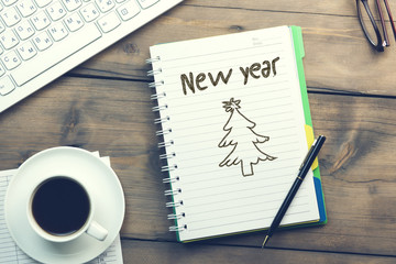 new year text on notepad
