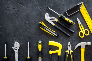 set of tools for build and repair house on dark background top view mock-up