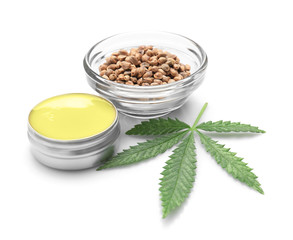 Composition with hemp lotion on white background