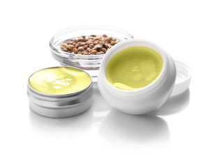 Composition with hemp lotion on white background