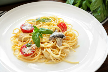 Plate with delicious roasted turkey tetrazzini, close up