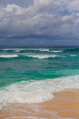 Indian ocean texture. Turquoise sea water with white foam and big wave. Powerful and peaceful nature concept.