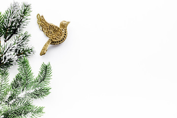 new year 2018 greeting with spruce branches and decorations with bird toys on white background top veiw space for text