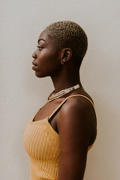 Side profile portrait of a beautiful black woman.