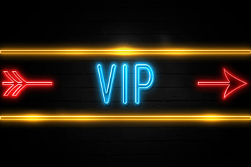 Vip  - fluorescent Neon Sign on brickwall Front view