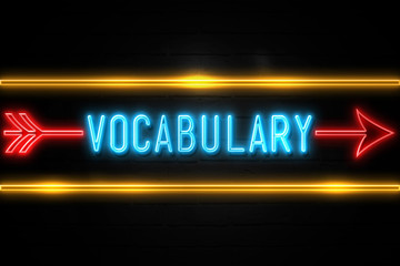 Vocabulary  - fluorescent Neon Sign on brickwall Front view