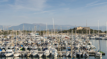 Luxurious super yachts in Port Vauban in Antibes, France overlooking Fort Carre 
