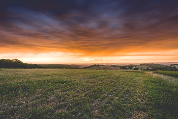 Sunrays through clouds at stormy weather