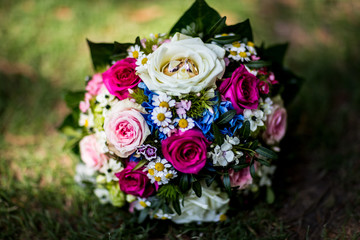 wedding flowers and rings