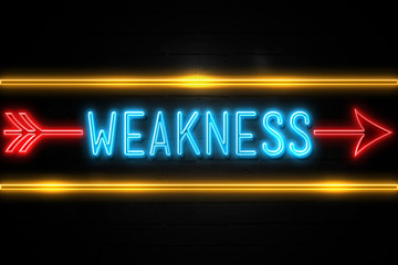 Weakness  - fluorescent Neon Sign on brickwall Front view
