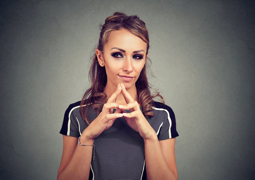 sly, scheming woman plotting something