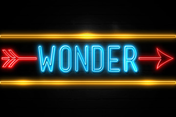 Wonder  - fluorescent Neon Sign on brickwall Front view