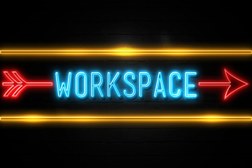 Obraz premium Workspace - fluorescent Neon Sign on brickwall Front view