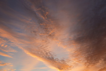 Fototapeta na wymiar Beautiful clouds at sunrise, improbable sky