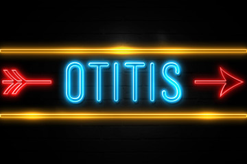 Otitis  - fluorescent Neon Sign on brickwall Front view