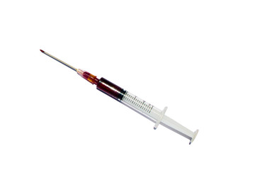 Fototapeta premium injection needle and Red liquid isolated on white background