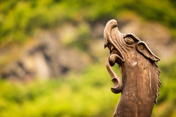 Part of old wooden viking boat in norwegian nature