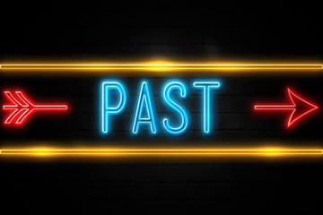 Past  - fluorescent Neon Sign on brickwall Front view