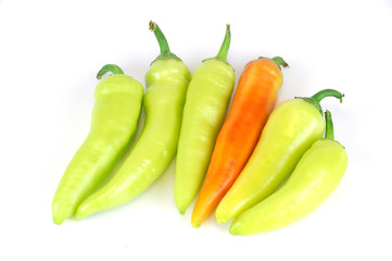 Fresh picked pepper in green and orange color